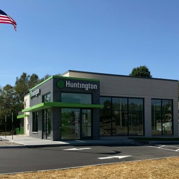 Exterior view of Huntington Bank with flag